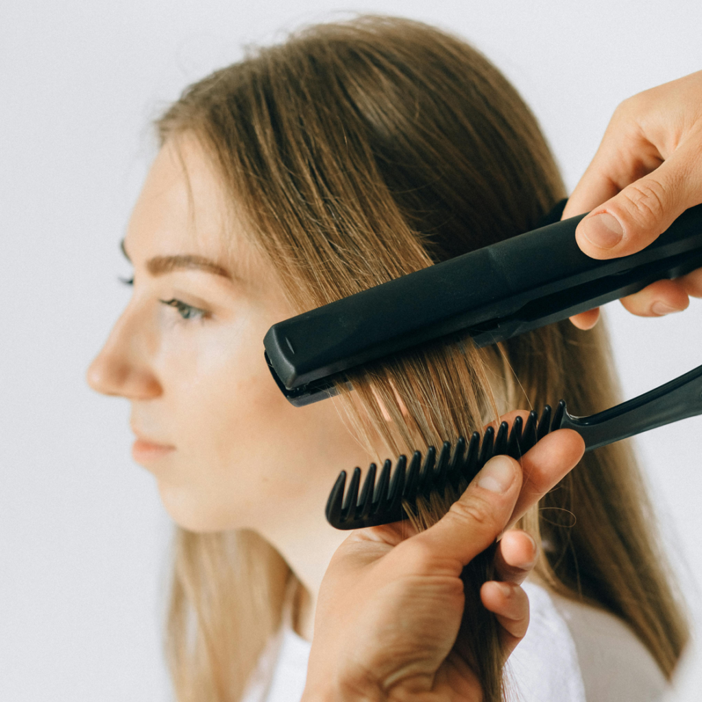 Blonde Woman Getting Styled